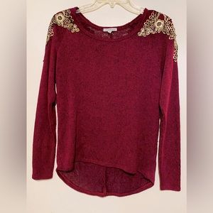 Vintage Charlotte Russe sweater with gold trim.